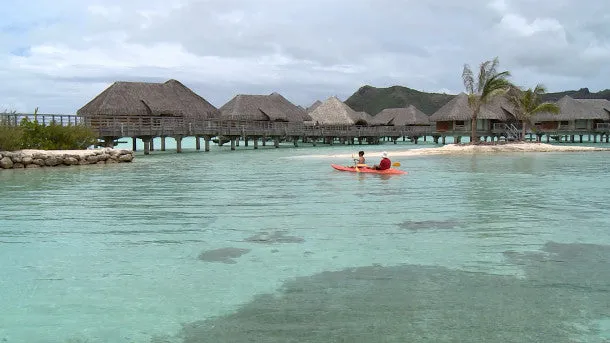 Couple Paddles Kayak in Bora Bora